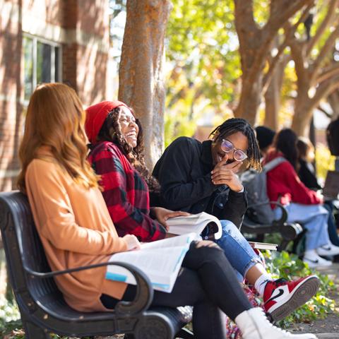 Students laughing outside the Morgan University Center